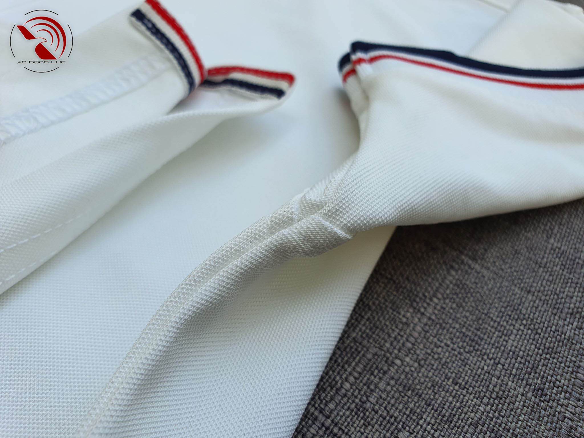 Áo polo phối sọc trắng - aodongluc Chi tiết sản phẩm áo cổ trụ polo bo sọc cá sấu lạnh poly thấm hút màu trắng