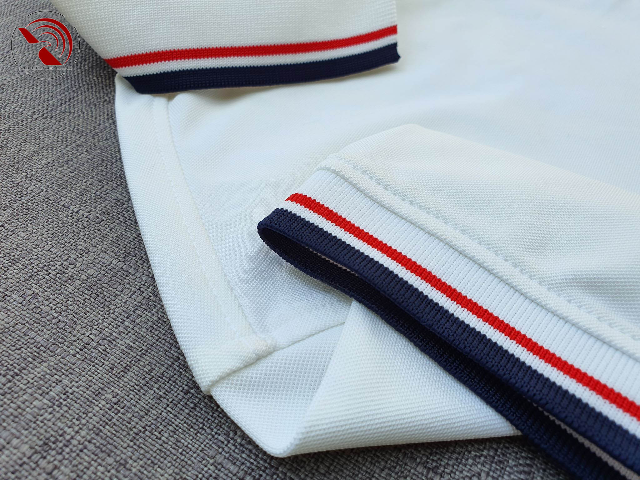 Áo polo phối sọc trắng - aodongluc Chi tiết sản phẩm áo cổ trụ polo bo sọc cá sấu lạnh poly thấm hút màu trắng