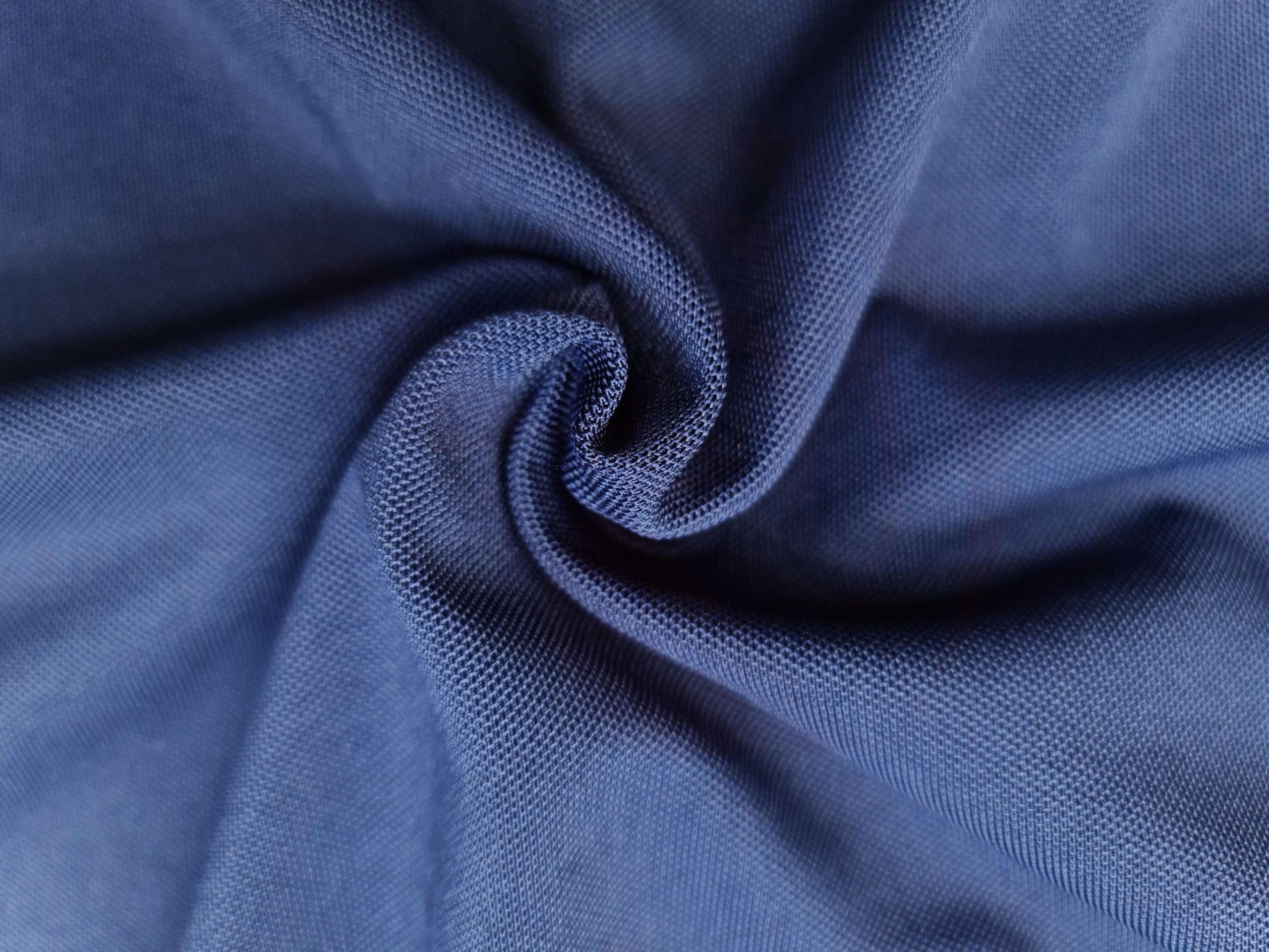 Chất vải áo thun cổ trụ polo bo trơn cá sấu lạnh poly thấm hút xanh đen