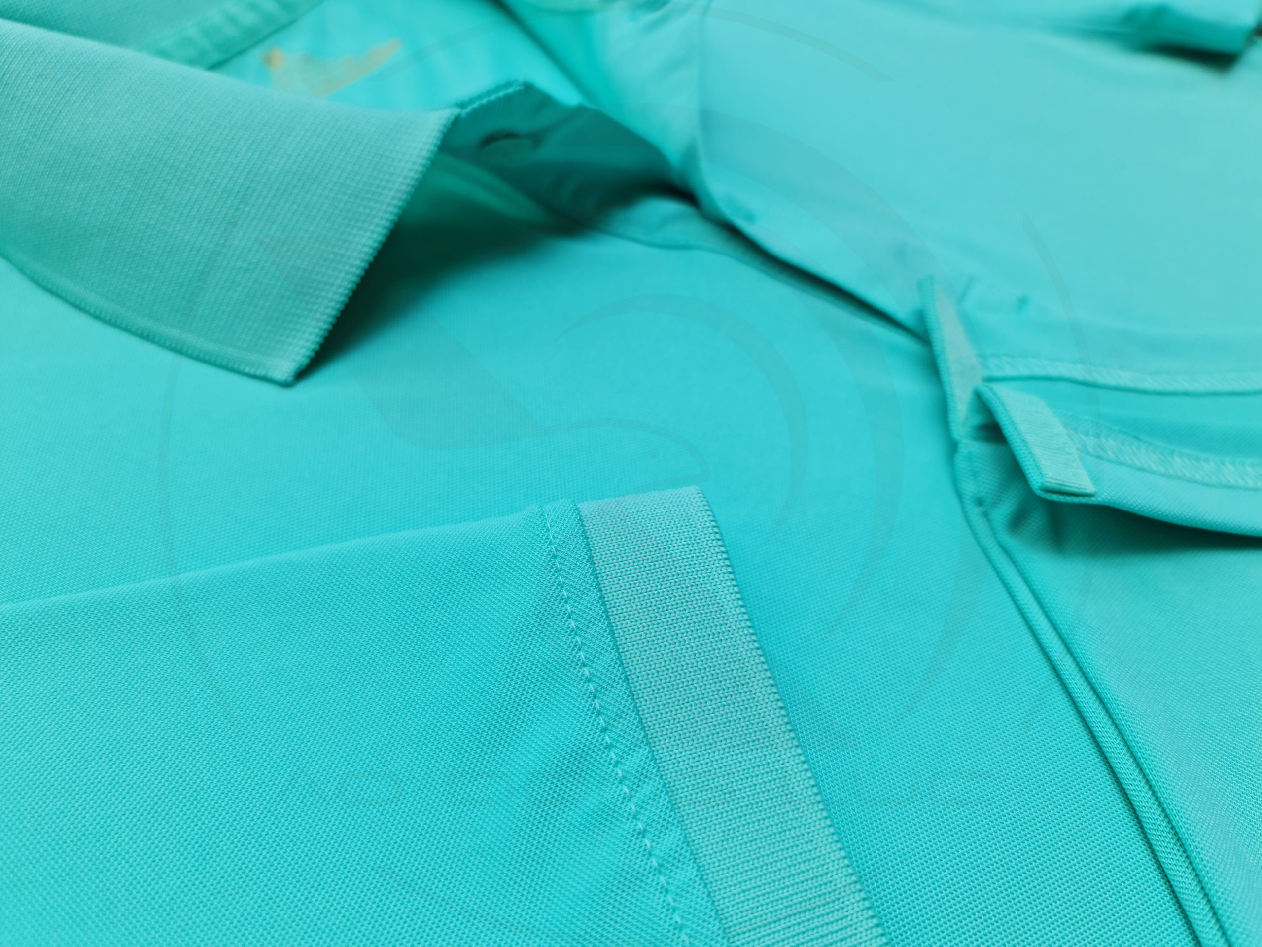 áo thun polo, áo thun trơn, áo cổ trụ, cổ bẻ, áo phông Chi tiết đường may và vạt áo áo thun cổ trụ polo bo trơn cá sấu lạnh xanh ngọc