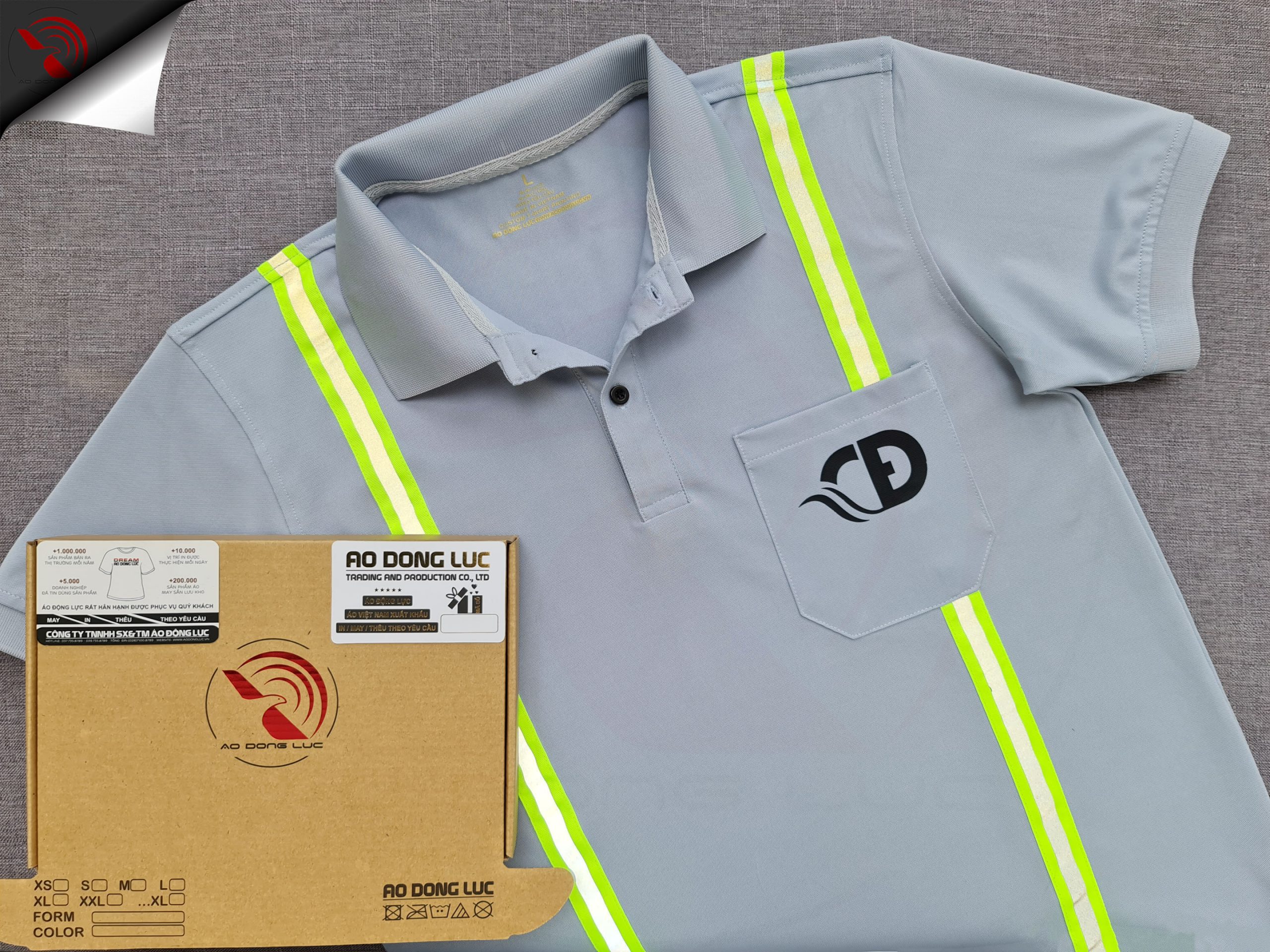 Đồng phục áo thun polo màu xám lam may phối dây quảng quang in kỹ thuật số