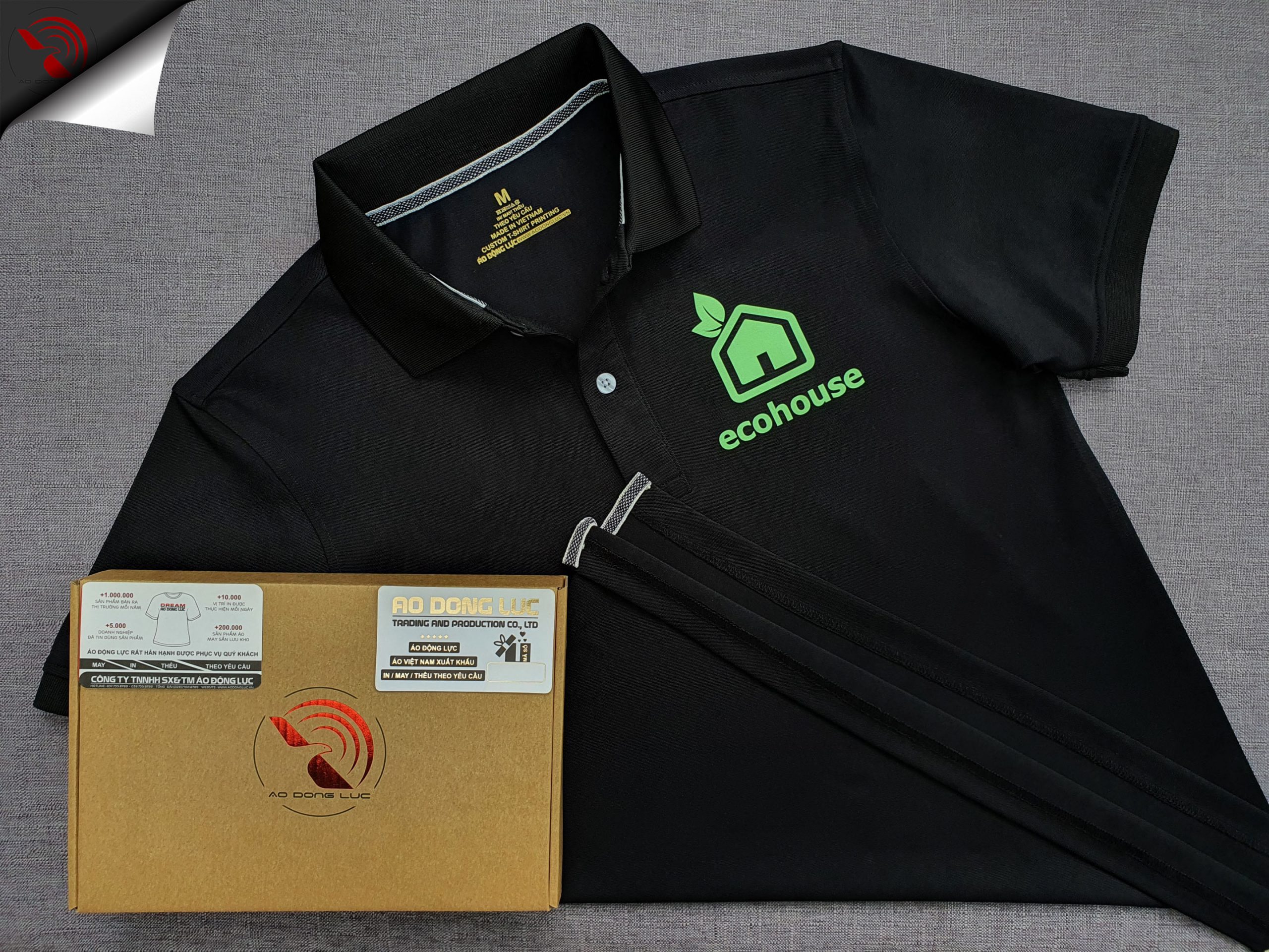 Đồng phục áo thun polo bo trơn màu đen in dạ quang logo