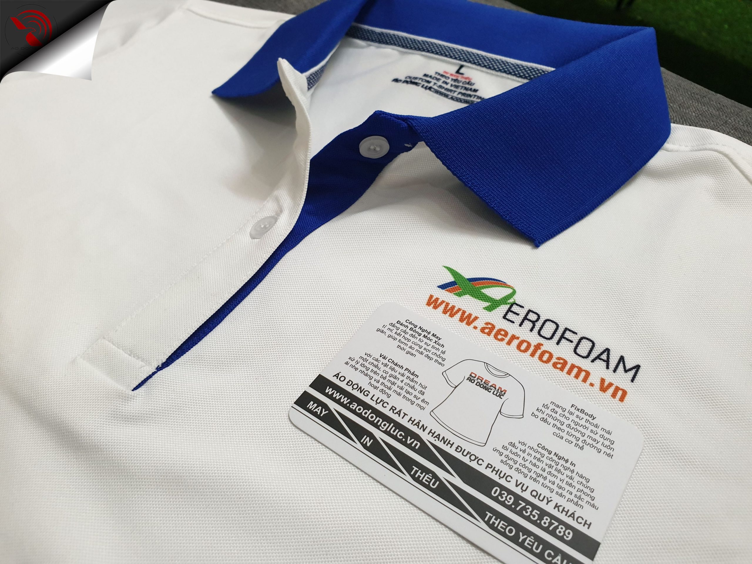 Đồng phục áo thun polo màu trắng phối xanh bích in chuyển nhiệt logo