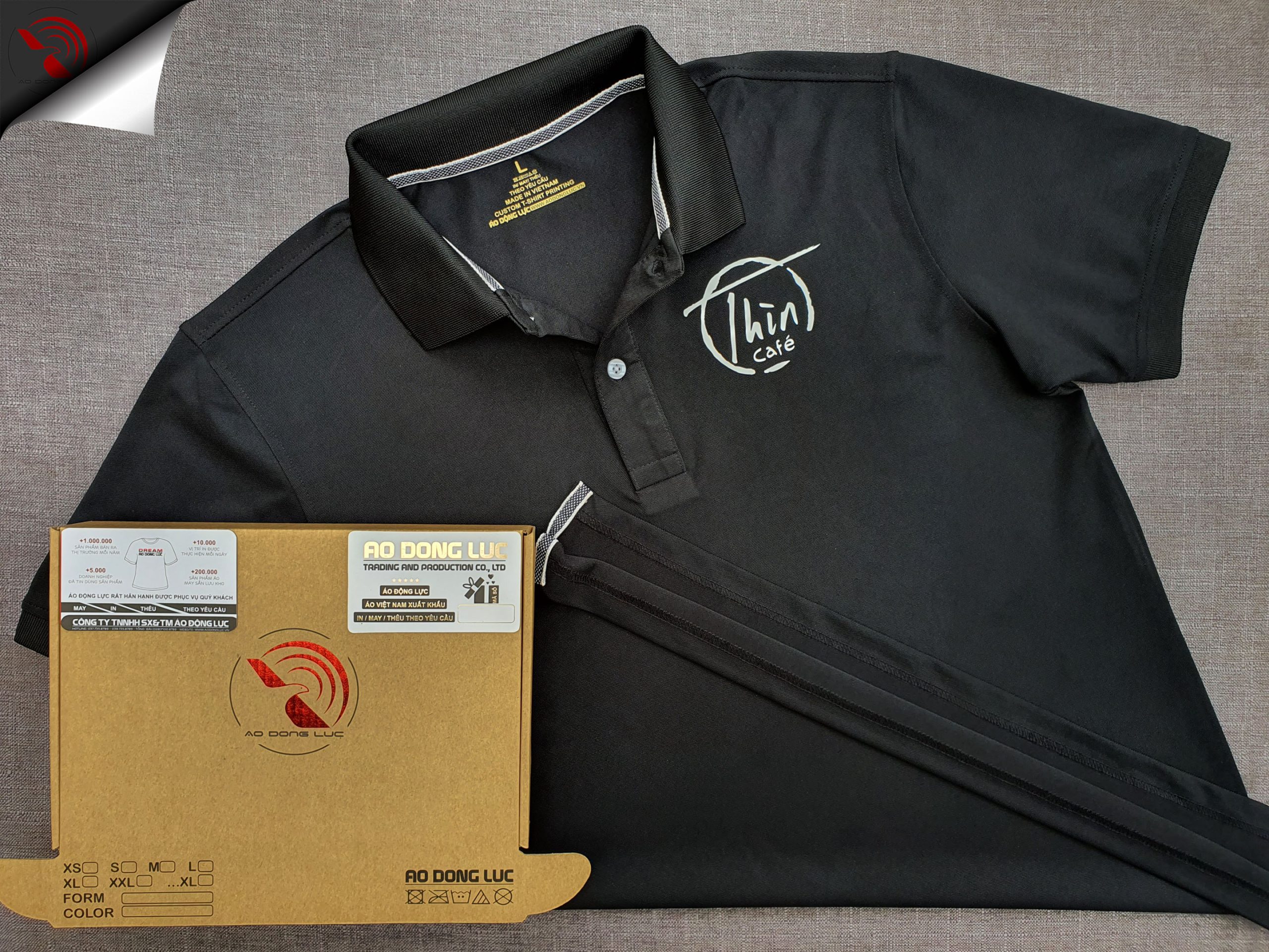 Đồng phục áo thun polo bo trơn màu đen in lụa