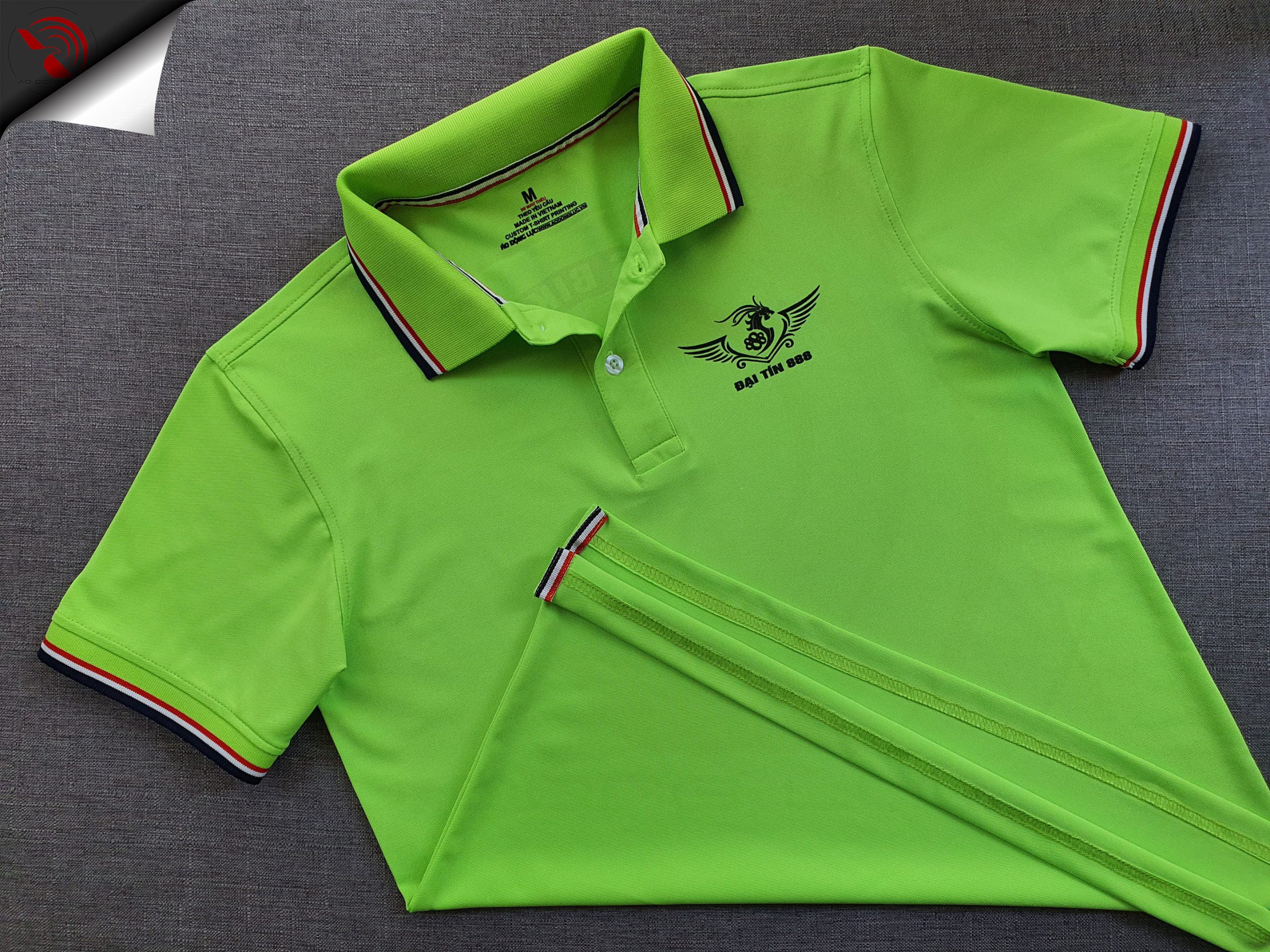 Đồng phục áo thun polo bo sọc xanh chuối in logo