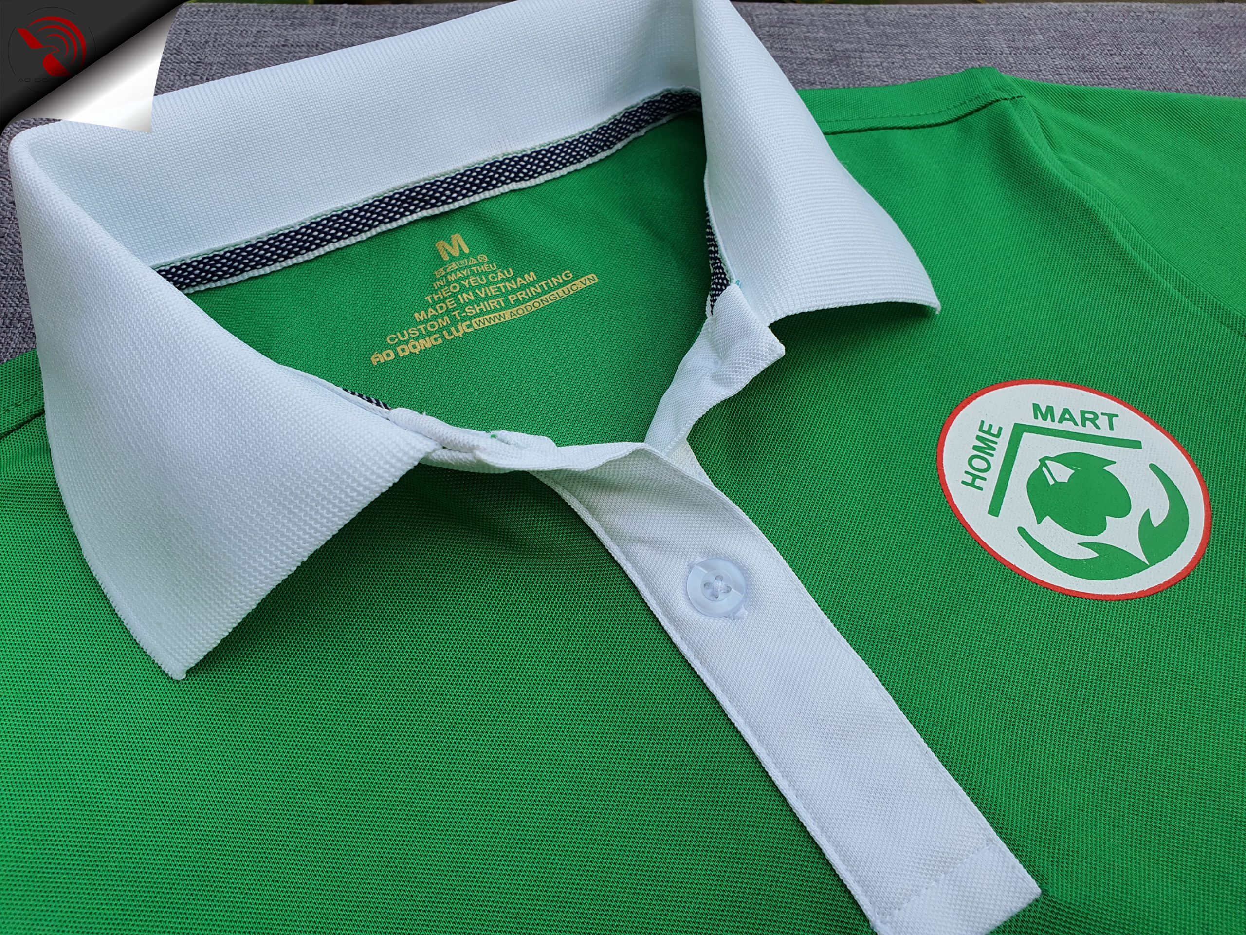 Đồng phục áo thun polo xanh két phối trắng in lụa logo