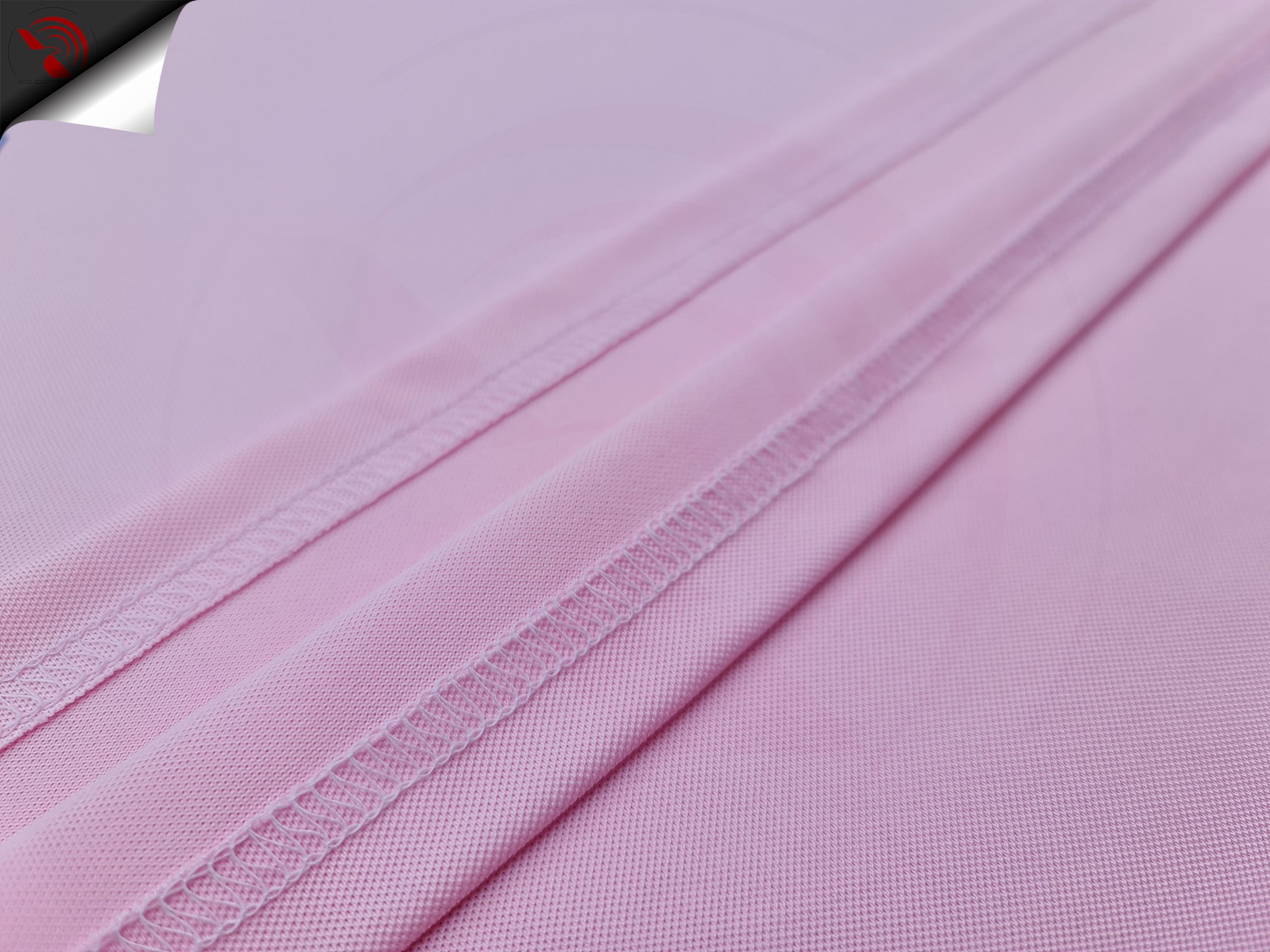 Chi tiết đường may áo thun đồng phục polo bo trơn hồng phấn