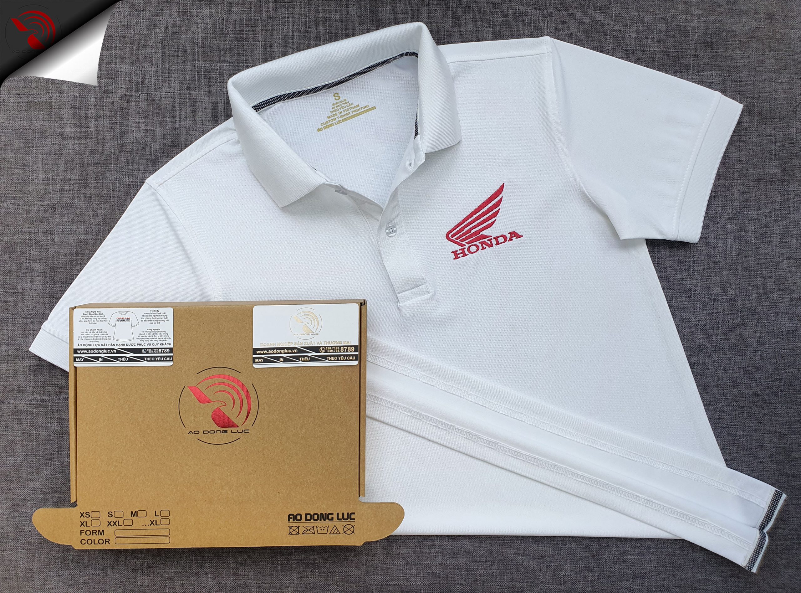 Đồng phục áo thun polo bo trơn màu trắng thêu logo