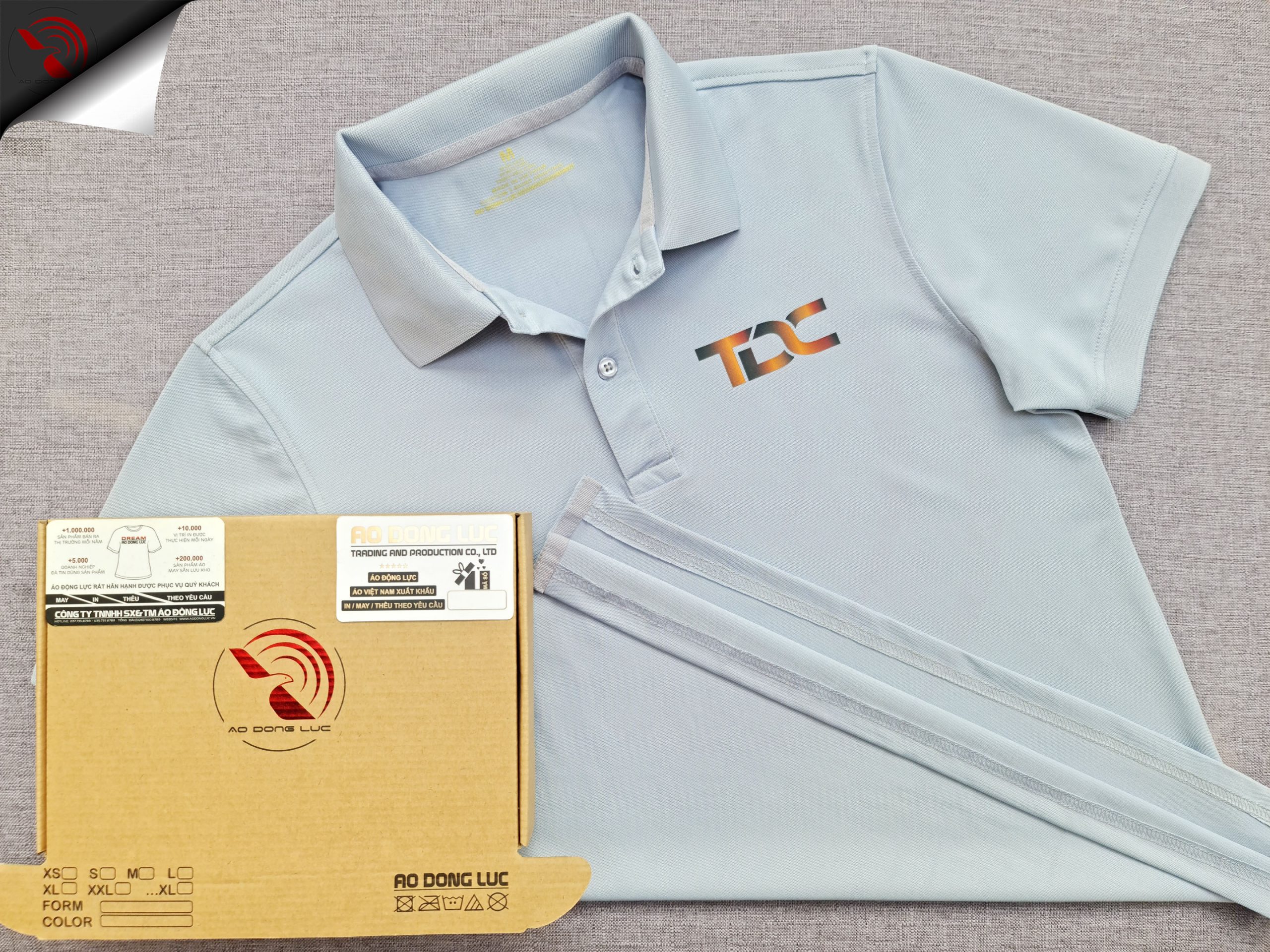 Đồng phục áo thun polo bo trơn xám lam in kỹ thuật số logo