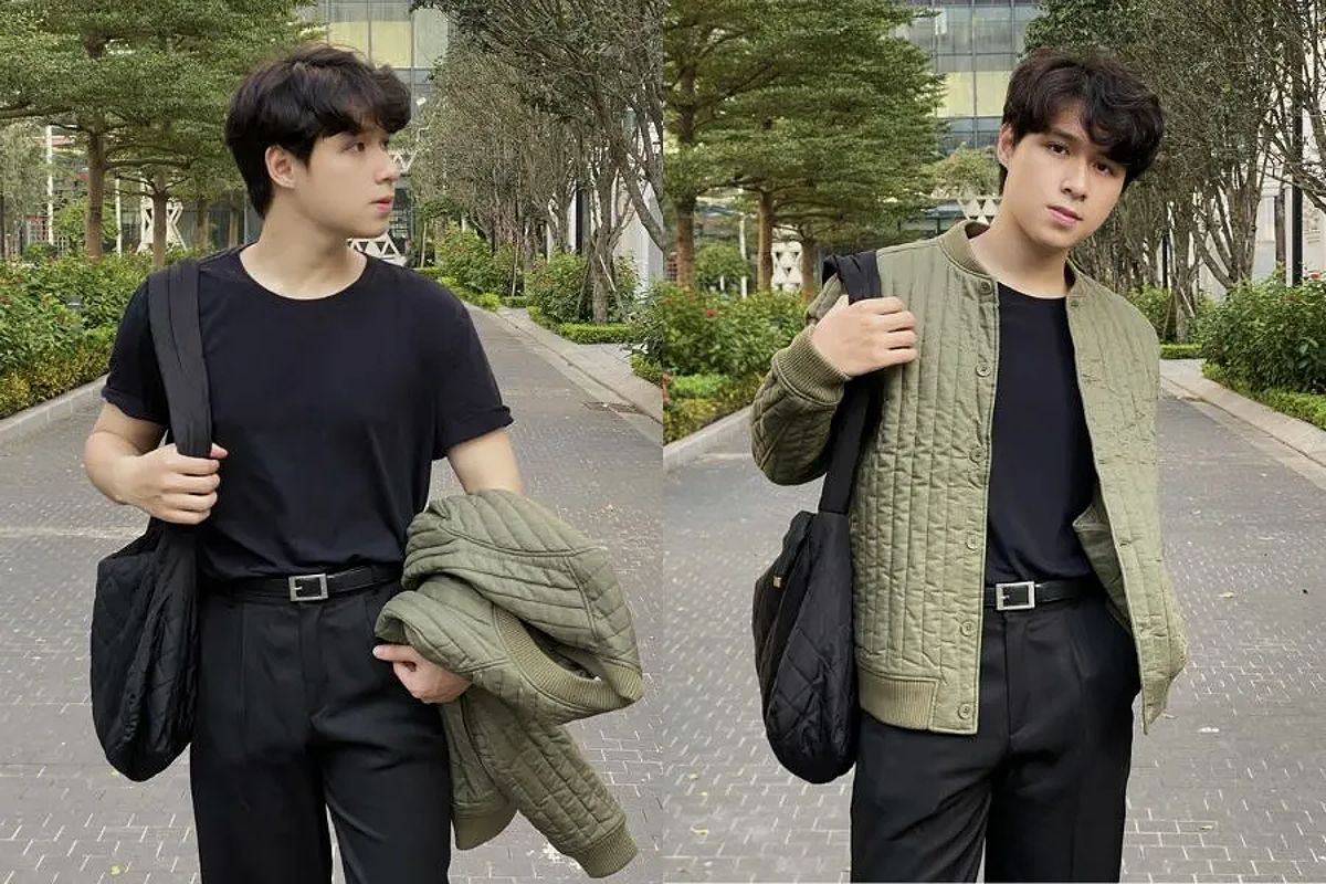 Chàng trai mặc áo thun trắng và áo khoác denim xanh